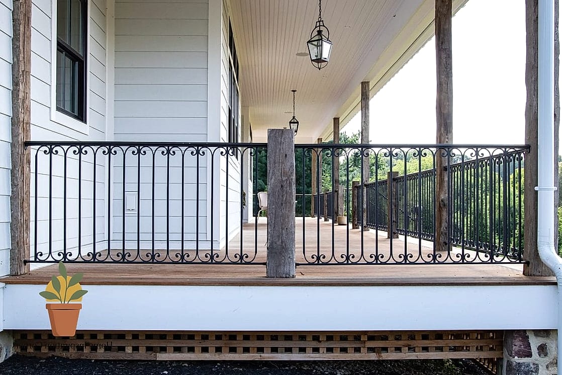 18 Iron Balcony Railing Designs You Need to See Right Now 11 Farmhouse-Style Iron Railings