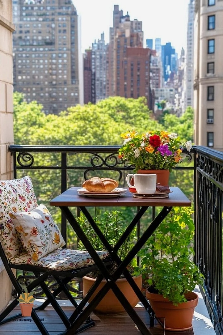 13 Small Balcony Decor Ideas From Homes We Absolutely Love 6 A Fold-Down or Wall-Mounted Table