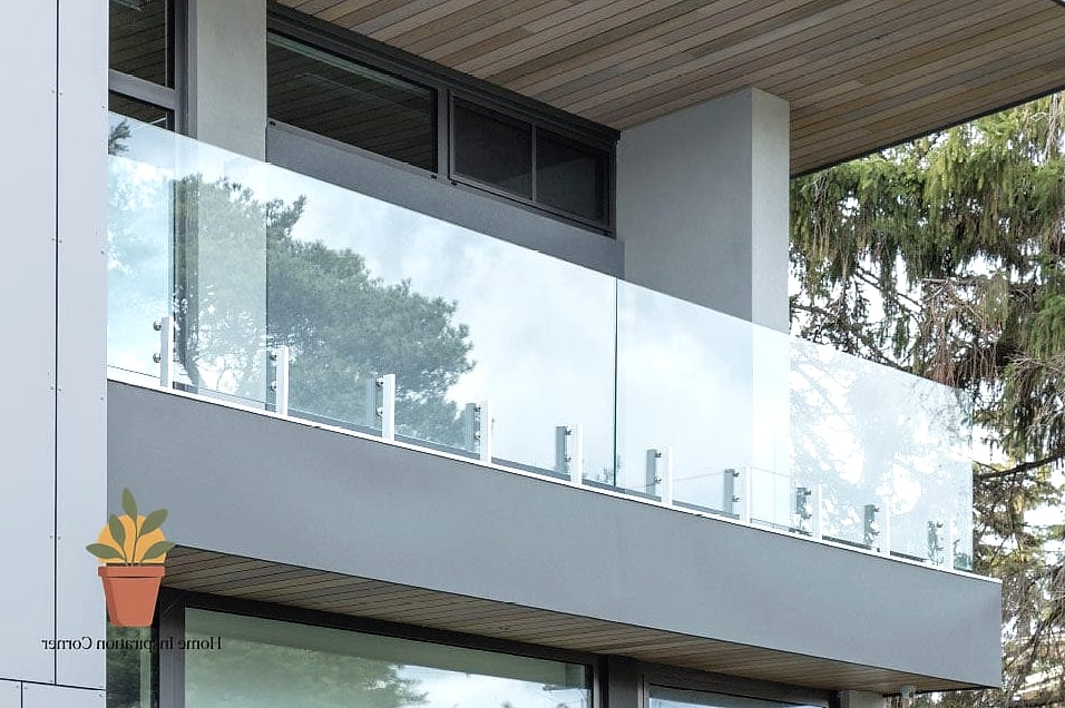 21 Glass Railing Balcony Looks We're Obsessed With This Year 2 Frameless Glass Panels for a Floating Effect