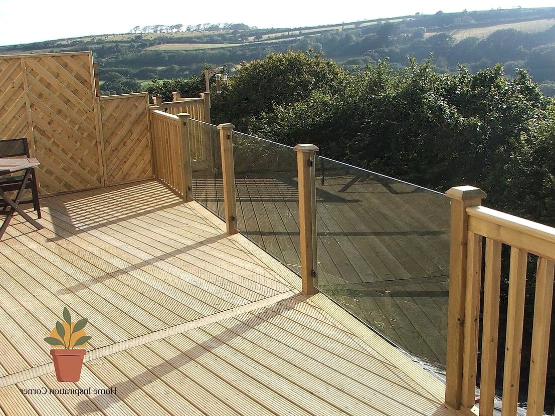 21 Glass Railing Balcony Looks We're Obsessed With This Year 5 Glass Railings with Wood Top Caps