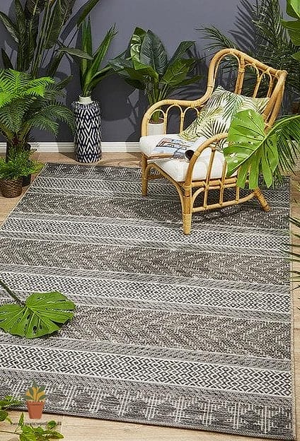 Add Outdoor Rugs to Soften Hard Flooring