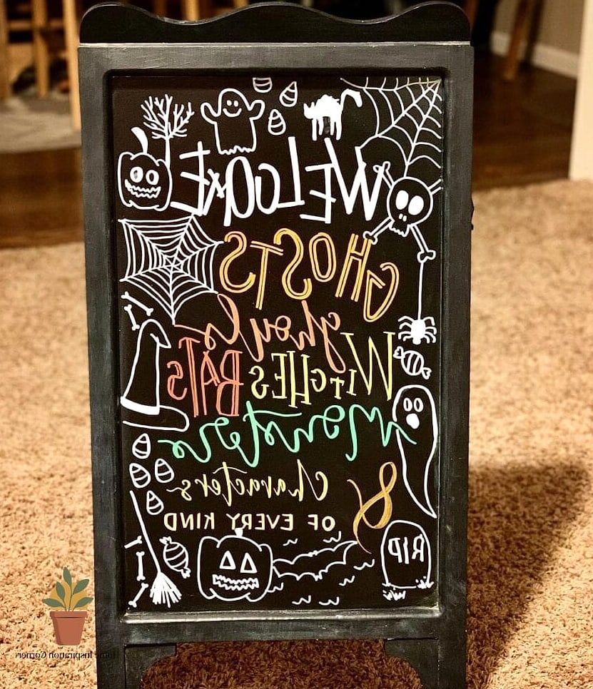 A Chalkboard Sign With a Spooky Message