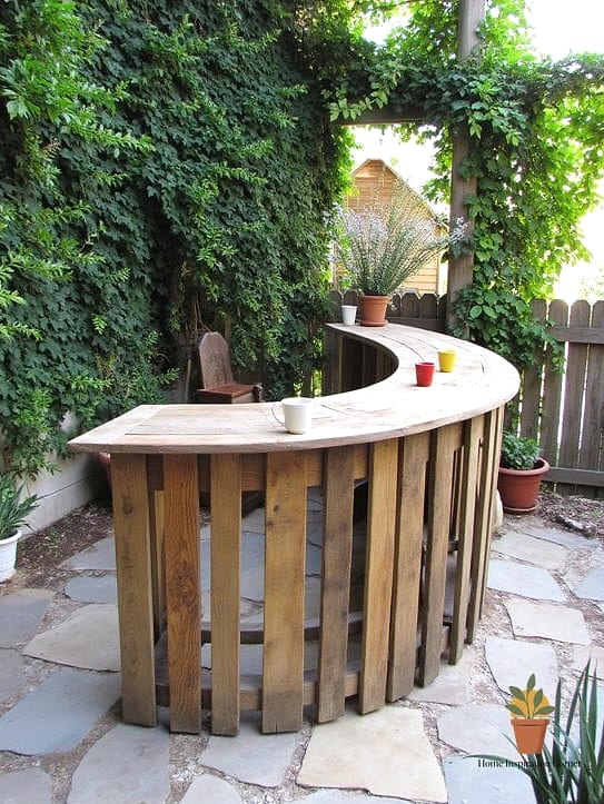 30 Backyard Bar Ideas Designs That Maximize Style and Function 2 Compact Pallet Wood Bar for Small Patios