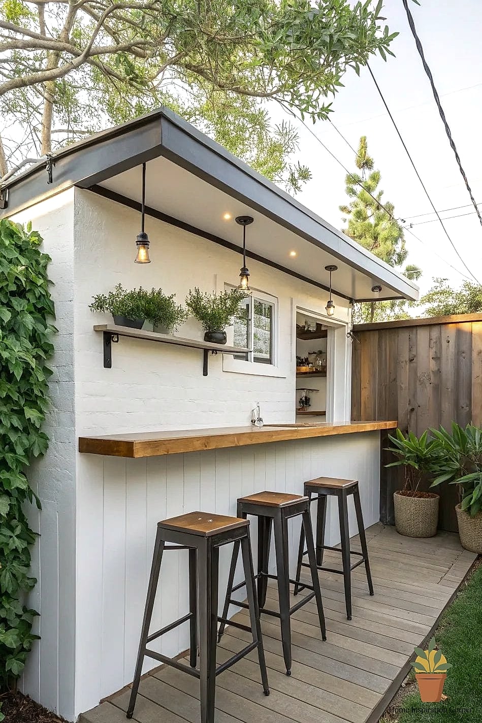 Compact L-Shaped Concrete Block Kitchen