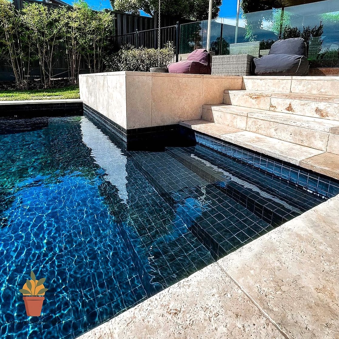 Dark Tile for a Moody, Reflective Pool