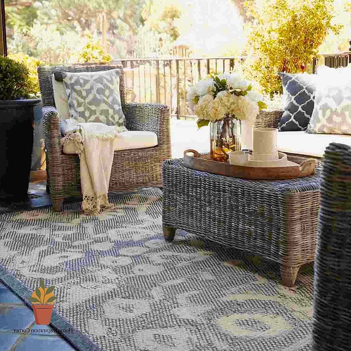 Outdoor Rug Layering on Concrete Patios