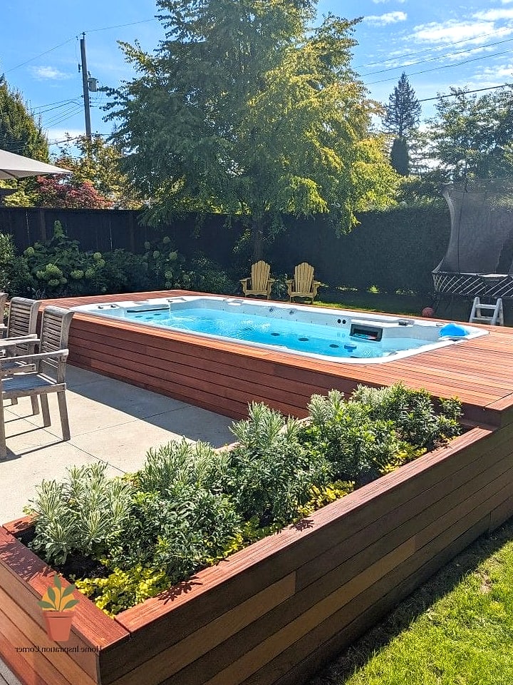 19 Backyard Patio Designs With Pool Makeovers That Look Incredibly Expensive 5 Raised Spa with a Stacked Stone Waterfall