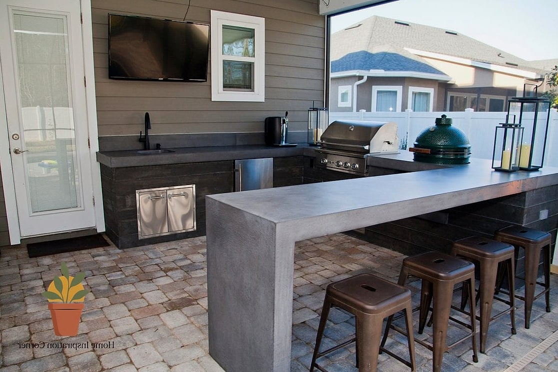 30 Backyard Bar Ideas Designs That Maximize Style and Function 6 Sleek Concrete Bar with Waterfall Edge