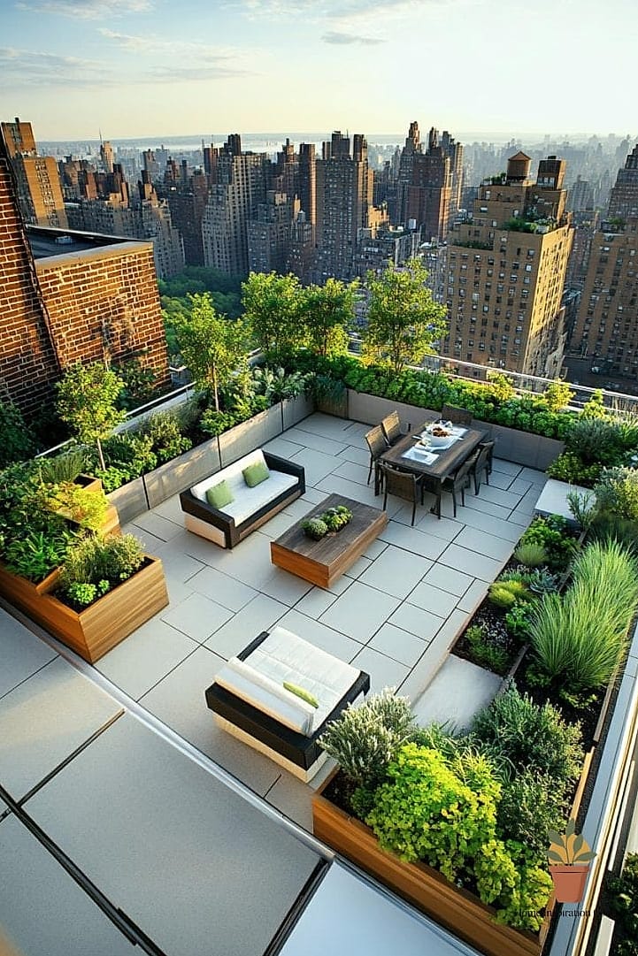A Statement Outdoor Rug Paired with Bold Planters