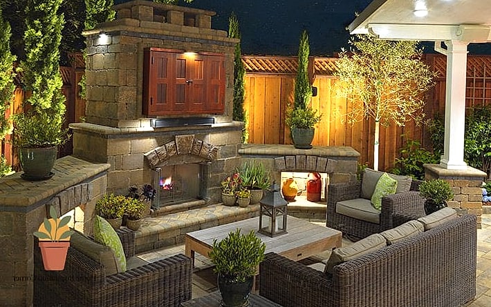 Uplit Fireplace with Layered Landscape Lighting