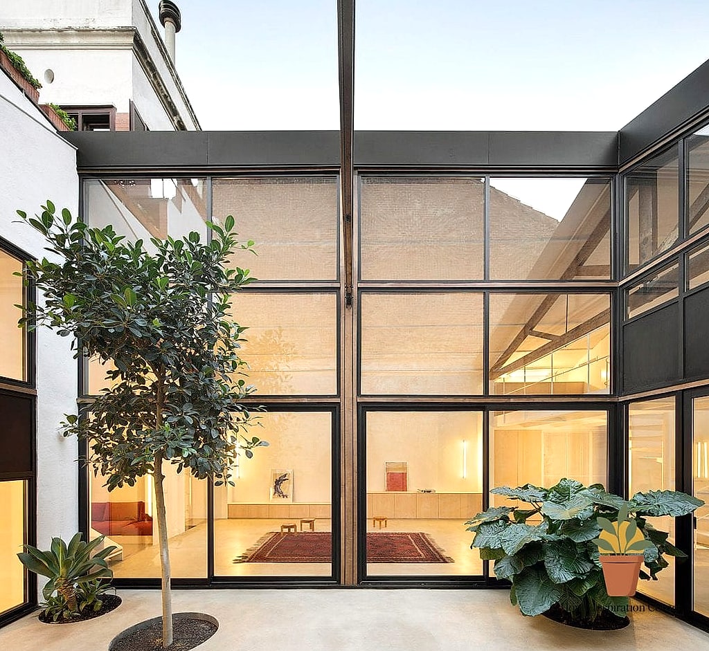 19 Patio Interno Ideas That Are Both Stylish and Practical 9 Use Large-Format Tile for a Seamless Look