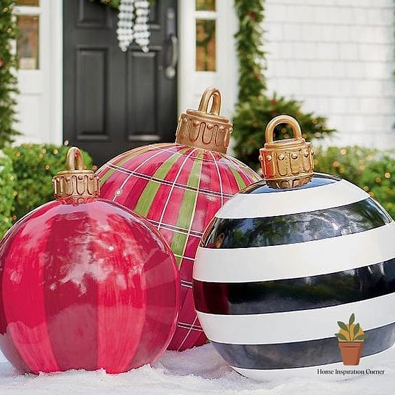 Use Oversized Ornaments as Yard Art